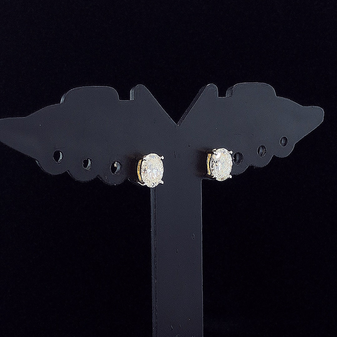 0.65cts Solitaire Oval Diamond Earrings